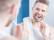 Man brushing teeth in Springfield