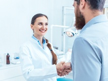 Man shaking hands with dentist