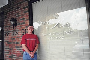 Dr. Scott Olson in front of his practice