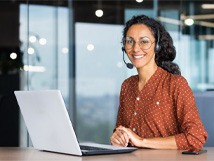 a call center worker smiling 