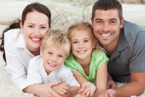 young family smiling