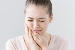 Woman with tooth pain