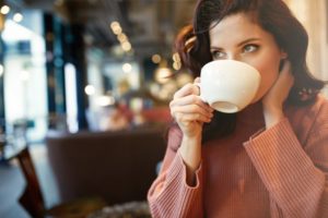 Woman drinking coffee