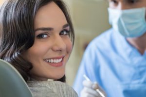 Woman with bright smile showing her teeth