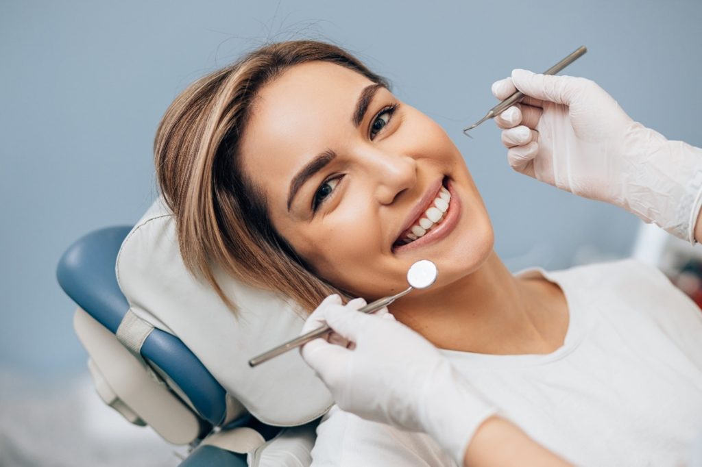 Woman smiling during dental checkup